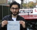 Hassan Mahmood with Driving test pass certificate
